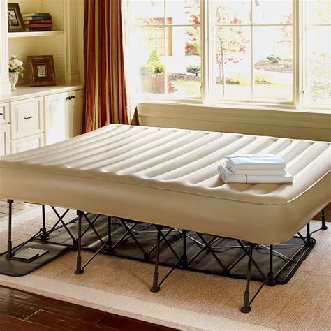 Fitted sheet has attached skirt to create the look of a more permanent bed. . Frontgate ez bed